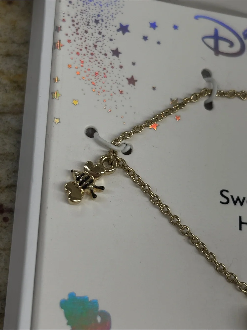 Disney Gold Tone bee and heart Bracelet
